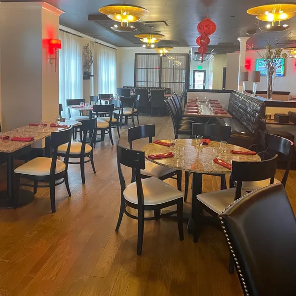 Spacious main dining hall with multiple dining tables at Shun Lee, a Chinese Restaurant in Lexington
